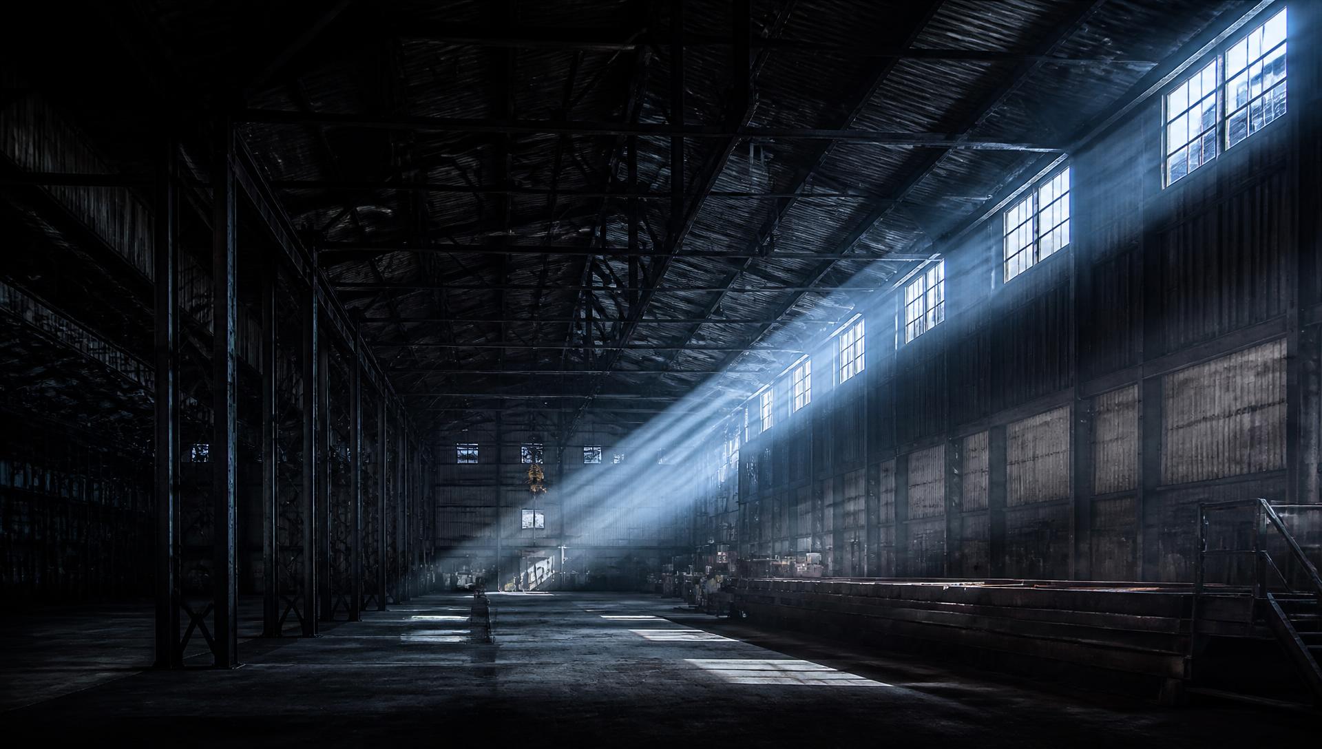 Industrial steel warehouse interior with dramatic light